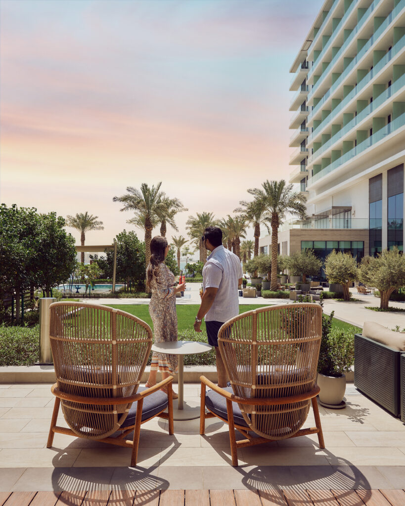 Open-air restaurant seating at The Garden, Address Beach Resort Bahrain