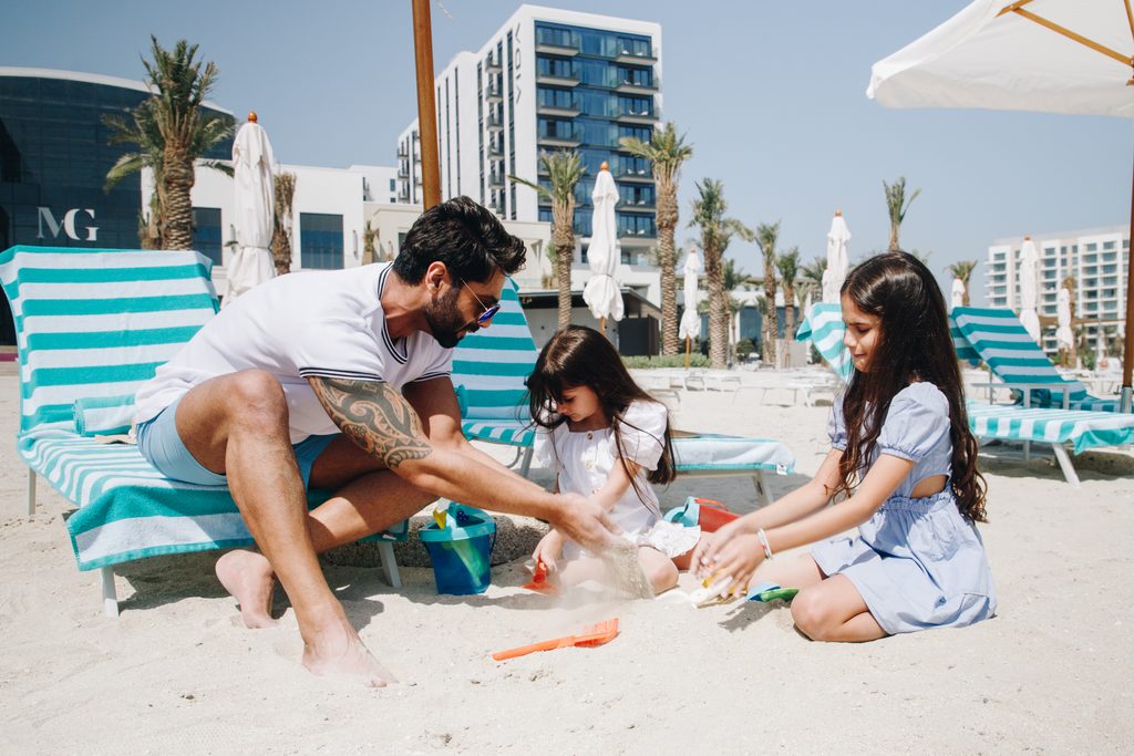 Family enjoying a Bahrain staycation at Vida Beach Resort Marassi Al Bahrain